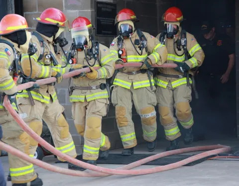 A Fire Ops 101 event arranged by the Lubbock Fire Rescue Department, Lubbock, Texas provides Texas Tech engineering students with the first-hand experience of various firefighting activities.
