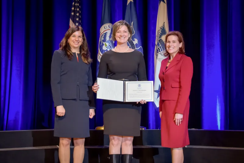 Stacey Rogers from the Federal Law Enforcement Training Center Hurricane Matthew Response and Recovery Team receive the Secretary's Unity Effort Award at the Department of Homeland Security Secretary's Awards Ceremony in Washington, D.C., Nov. 8, 2017. The team was honored for their response and recovery efforts during Hurricane Matthew, which damaged both FLETC's Glynco, Georgia and Charleston, South Carolina's campuses in October 2017. Official DHS photo by Jetta Disco.