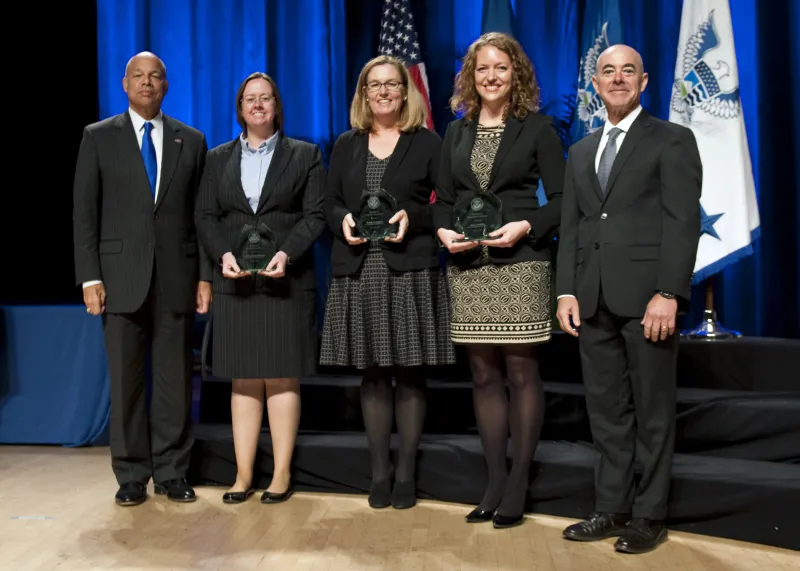 Secretary of Homeland Security Jeh Johnson and Deputy Secretary of Homeland Security Alejandro Mayorkas presented the Secretary's Award for Excellence to the Domestic Nuclear Detection Office TraPac Radiation Scanning for Automated Operations Team
