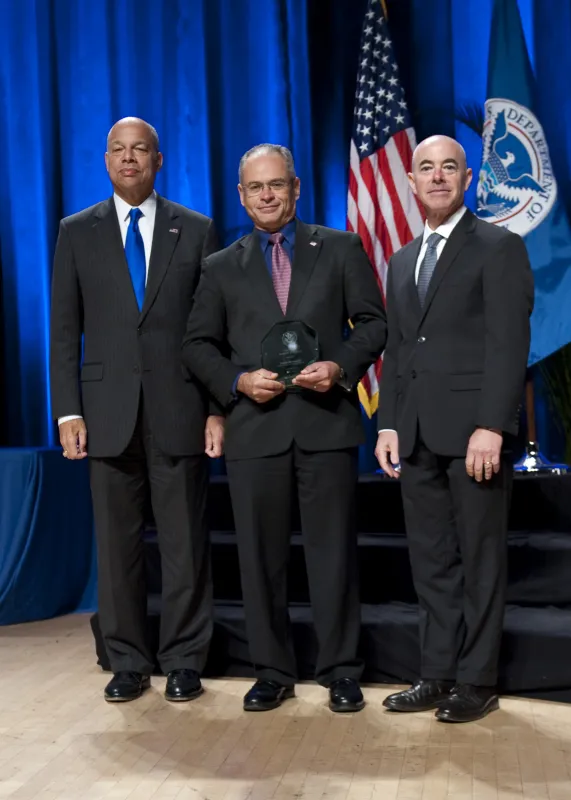 Secretary of Homeland Security Jeh Johnson and Deputy Secretary of Homeland Security Alejandro Mayorkas presented the Secretary's Unit Award to Emilio Hernandez, National Protection and Programs Directorate during the Secretary's Award Ceremony held Oct. 26, 2016.