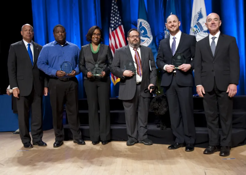 Secretary of Homeland Security Jeh Johnson and Deputy Secretary of Homeland Security Alejandro Mayorkas presented the Secretary's Unit Award the Federal Emergency Management Manufactured Housing Unit Team.