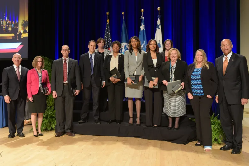 Secretary of Homeland Security Jeh Johnson and Deputy Secretary of Homeland Security Alejandro Mayorkas presented the Secretary’s Meritorious Service Silver Medal for outstanding innovation and collaboration to better secure sensitive information across the Department to Laura Auletta, Shaundra Duggans, Candace Lightfoot, Ellen Murray, Tamara Lilly, Scott Ackiss, Corey Lastinger, Kellie Riley, Kathleen L. Claffie and John Simms, Nov. 3, 2015. The Secretary’s Meritorious Service Silver Medal recognizes excep