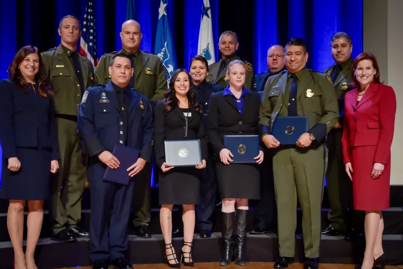 Joint Task Force - West receive the Secretary's Unity Effort Award at the Department of Homeland Security Secretary's Awards Ceremony in Washington, D.C., Nov. 8, 2017. JTF-West was honored for developing and implementing Operation All In, the first synchronized, department-wide operation designed to disrupt human smuggling activities across the Southwest Border resulting in 214 targets with ties to human smuggling networks and face civil and/or criminal penalties. Official DHS photo by Jetta Disco.