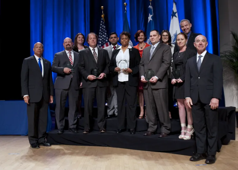 Secretary of Homeland Security Jeh Johnson and Deputy Secretary of Homeland Security Alejandro Mayorkas presented the Secretary's Unit Award to the Management Directorate Cybersecurity Team.