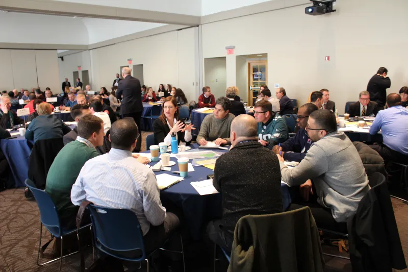 Participants at the 2018 Philadelphia RTTX discuss the exercise scenario among members of their institution of higher education. (DHS OAE)