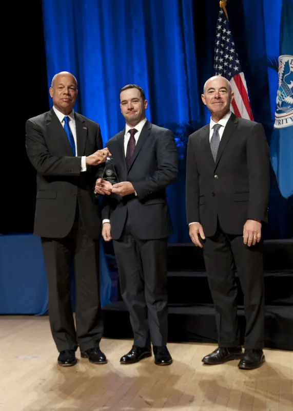 Secretary of Homeland Security Jeh Johnson and Deputy Secretary of Homeland Security Alejandro Mayorkas presented the Secretary's Award for Exemplary Service to Jerome Bishop
